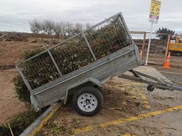 Trailer loaded with branches for our gardening and green waste removal service